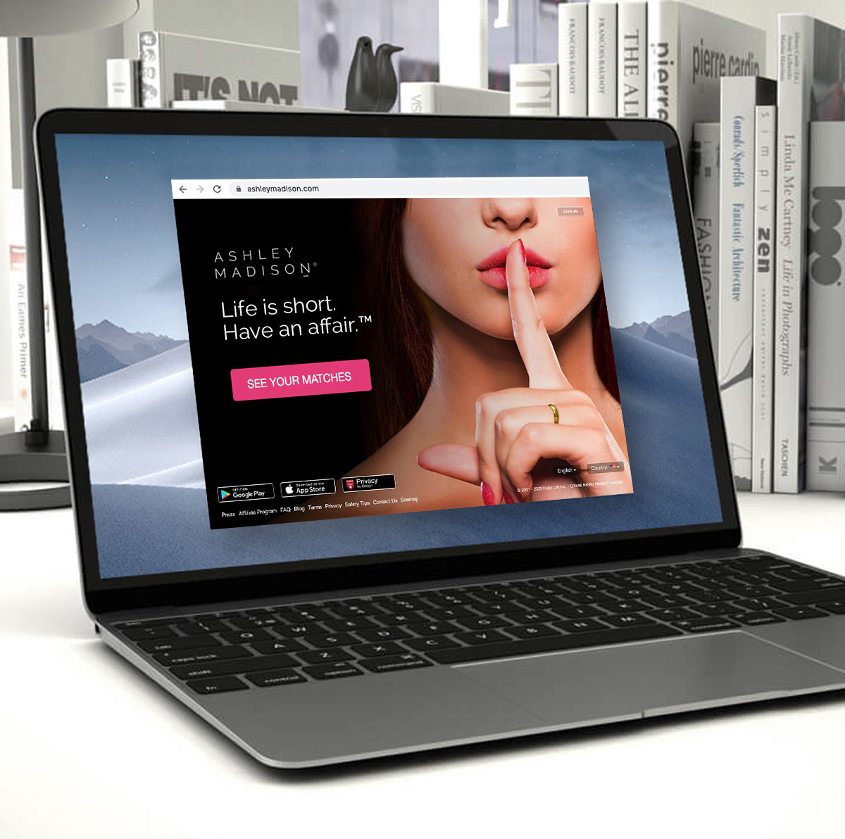 Laptop with ashleymadison.com on screen